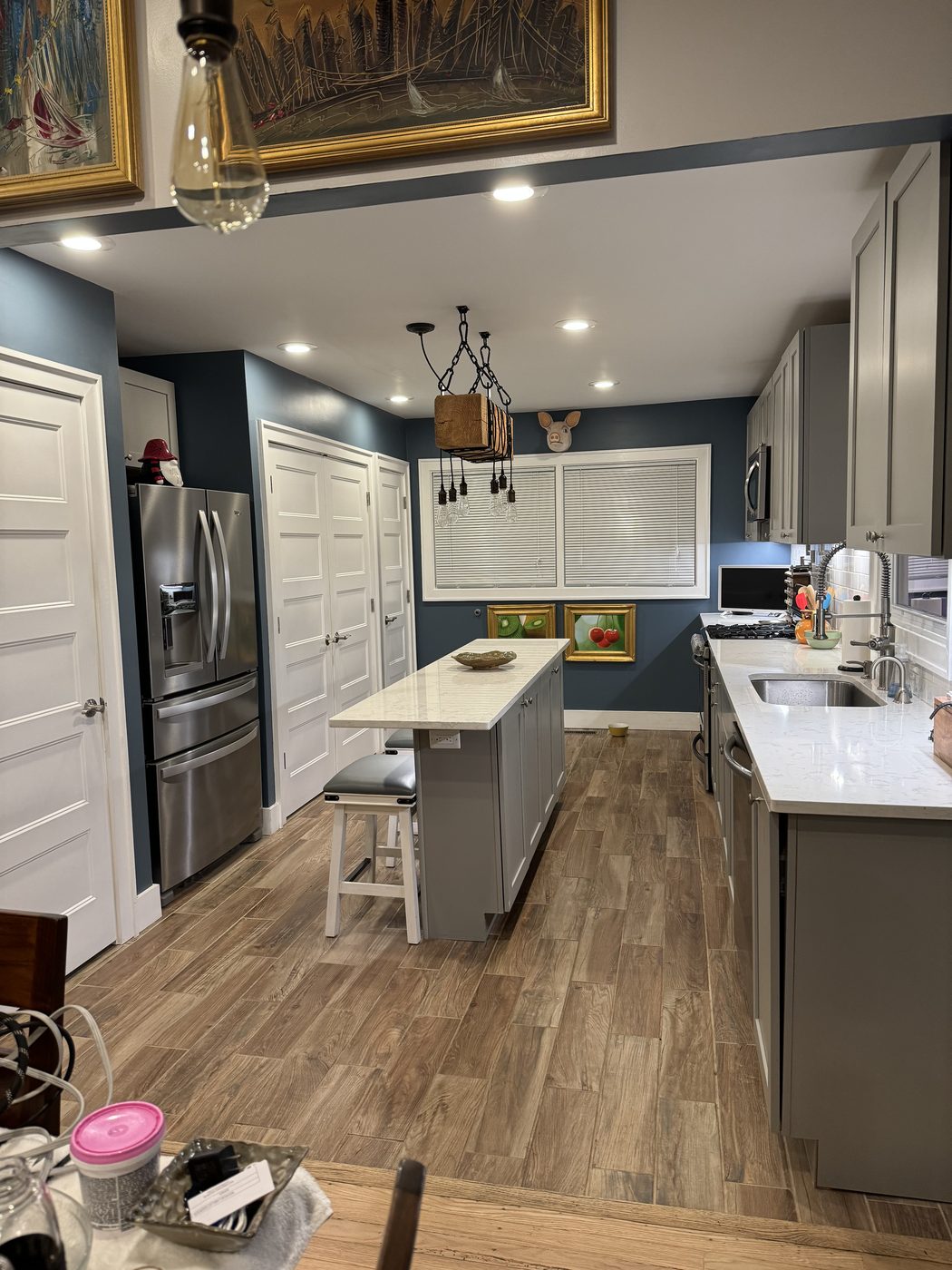 Before: a client's closed-in galley kitchen, boxed off by a load-bearing wall